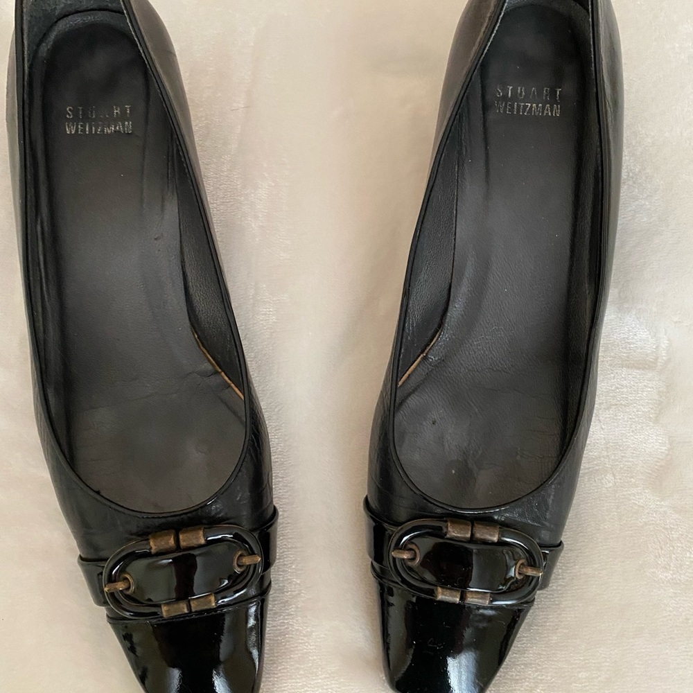 Stuart Weitzman black all leather with patent tip and patent wedge heal. Size 10